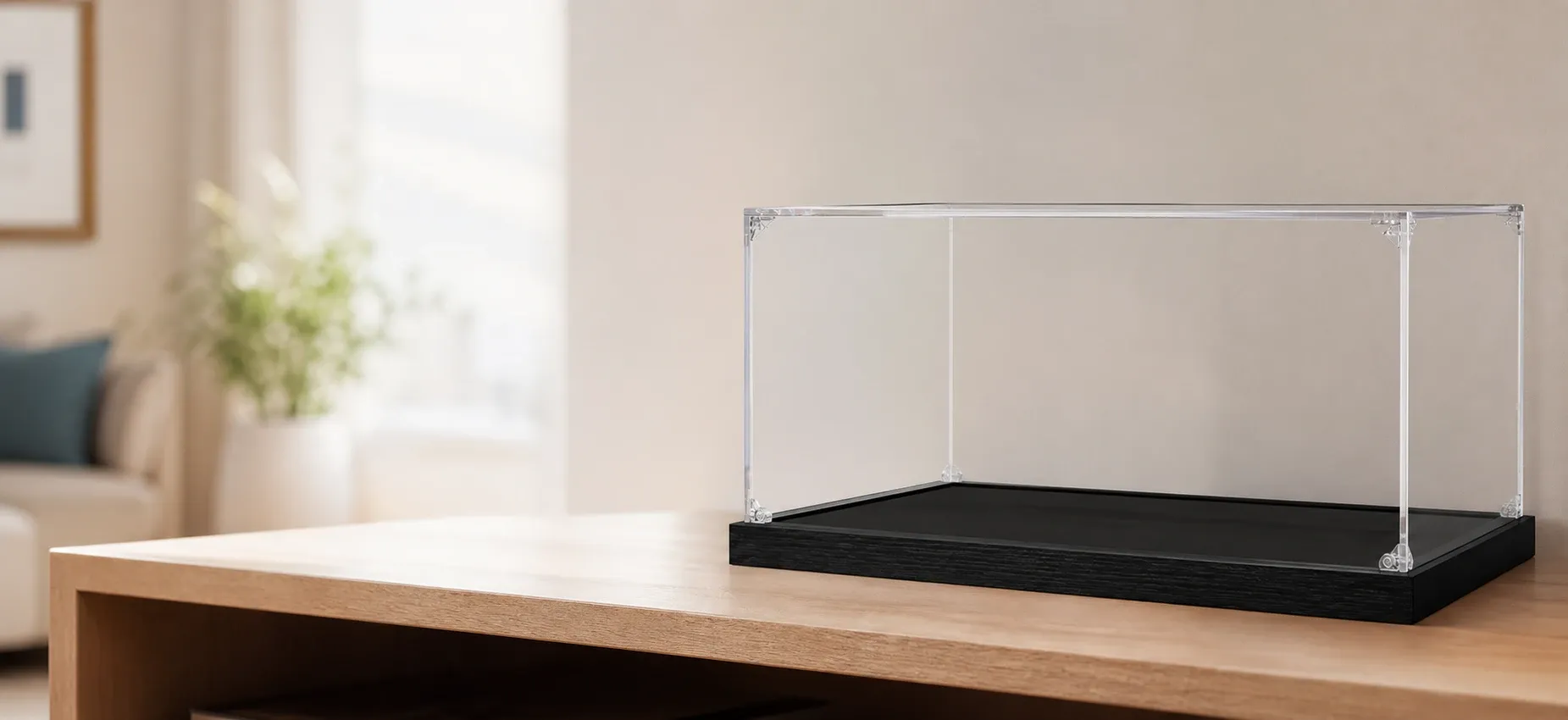 A premium acrylic model display case on a wooden table, designed to showcase large F1 or super sports car models, with a sleek black base and clear acrylic sides.